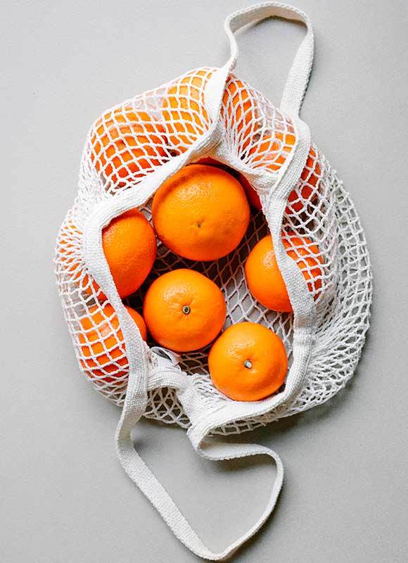 Bolsa de tela con naranjas